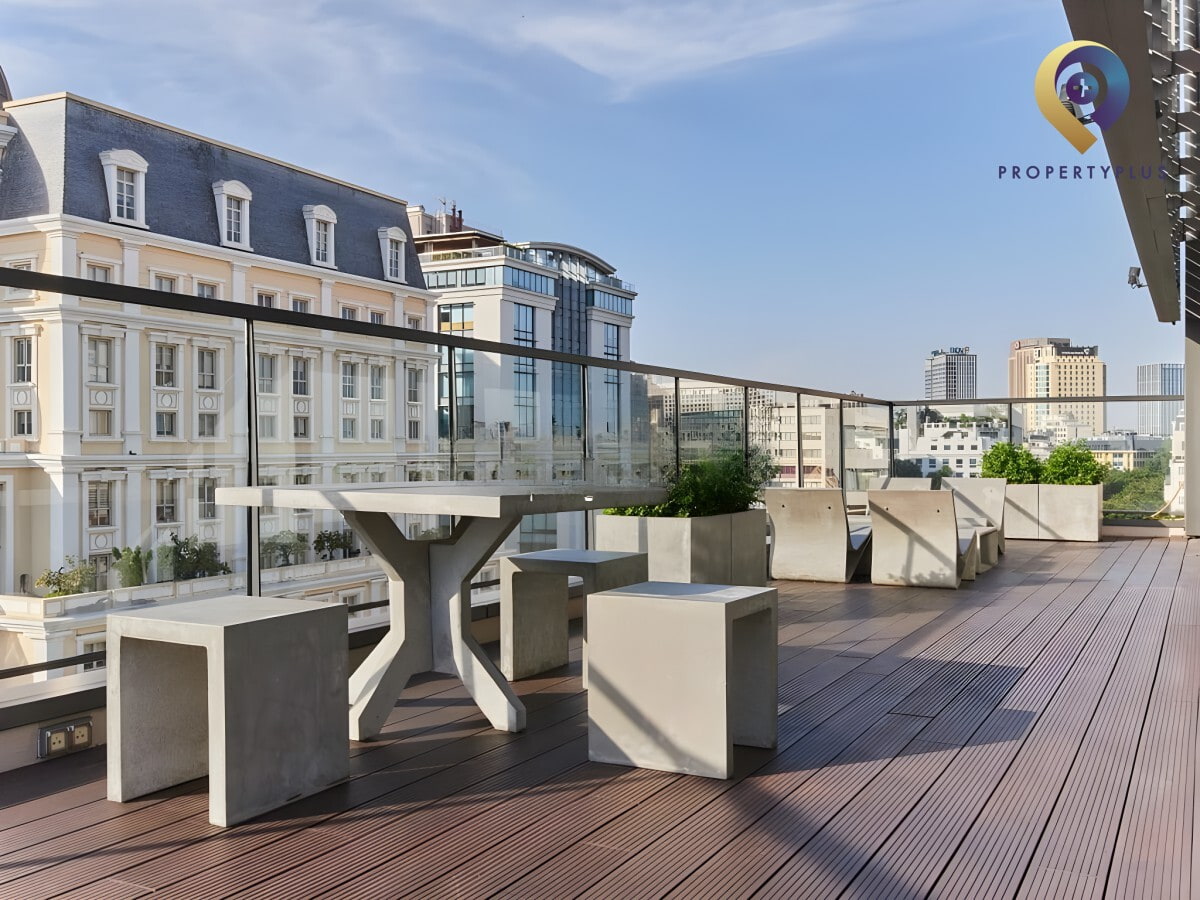 Rooftop terrace with modern seating and city view at Belvedere Building